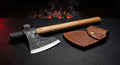 Hand forged bushcraft axe with a hammer poll, 19 inch ash handle and a stamped leather head cover