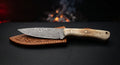 Damascus paring knife with a small raindrop pattern blade and a camel bone handle