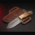 Damascus bull cutter knife with stag horn handle and tooled pancake sheath