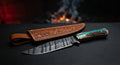 One of a kind Damascus bowie knife with a ladder pattern blade and a stag antler handle with a turquoise inlay