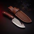 Damascus gut hook skinning knife with rosewood handle and tooled leather belt sheath