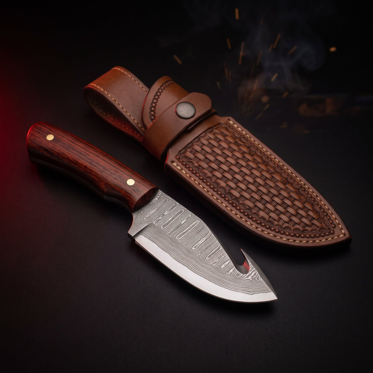 Damascus gut hook skinning knife with rosewood handle and tooled leather belt sheath