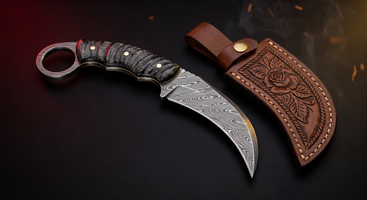 Damascus karambit knife with ram horn handle, finger ring and hand carved leather sheath