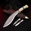 Damascus kukri with camel bone and turquoise handle, tooled leather scabbard, karda and chakmak