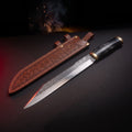 Damascus langseax with water buffalo horn handle and tooled leather sheath