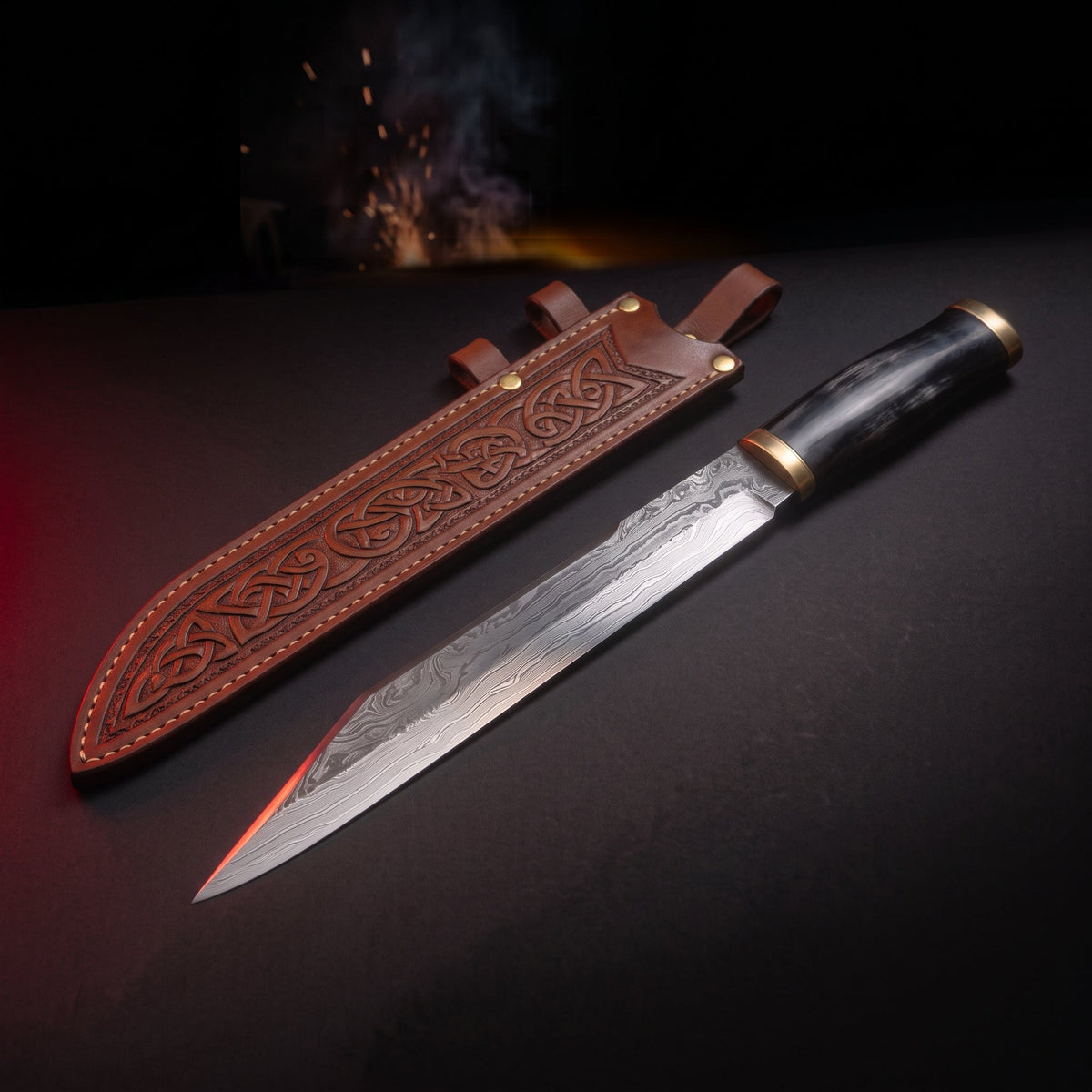 Damascus langseax with water buffalo horn handle and tooled leather sheath