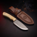 Damascus skinning knife with camel bone handle and tooled leather belt sheath