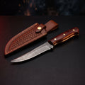 Damascus fillet knife with a 6.5 inch flexible blade, rosewood handle and a stamped leather sheath