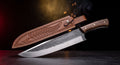 Hand forged butcher cimeter with rosewood handle and tooled leather sheath