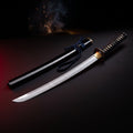 Hand forged 1095 katana with clay tempered blade, black lacquered saya and black cord wrapped handle