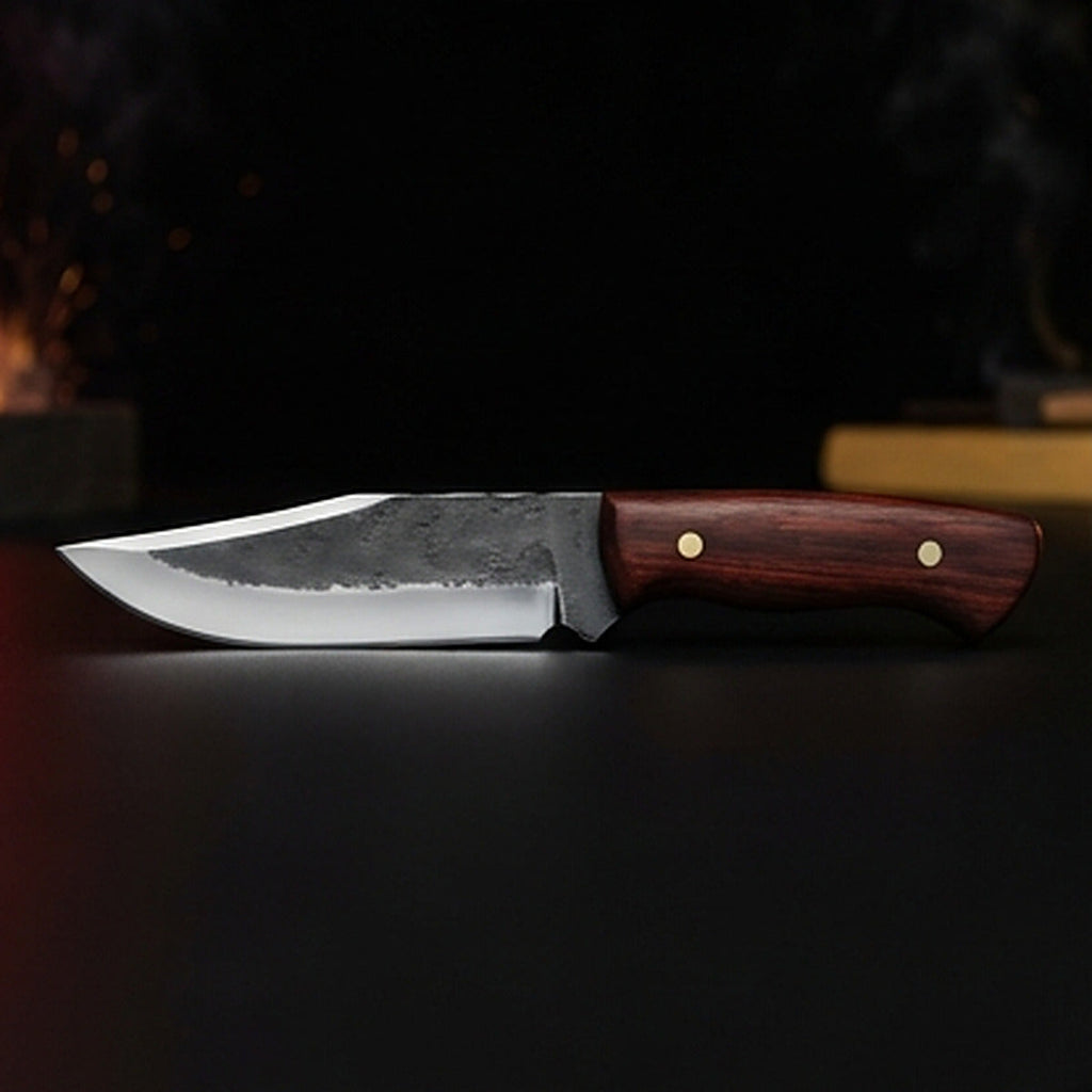 1095 high carbon steel drop point hunting knife with rosewood handle and brass pins, left side profile