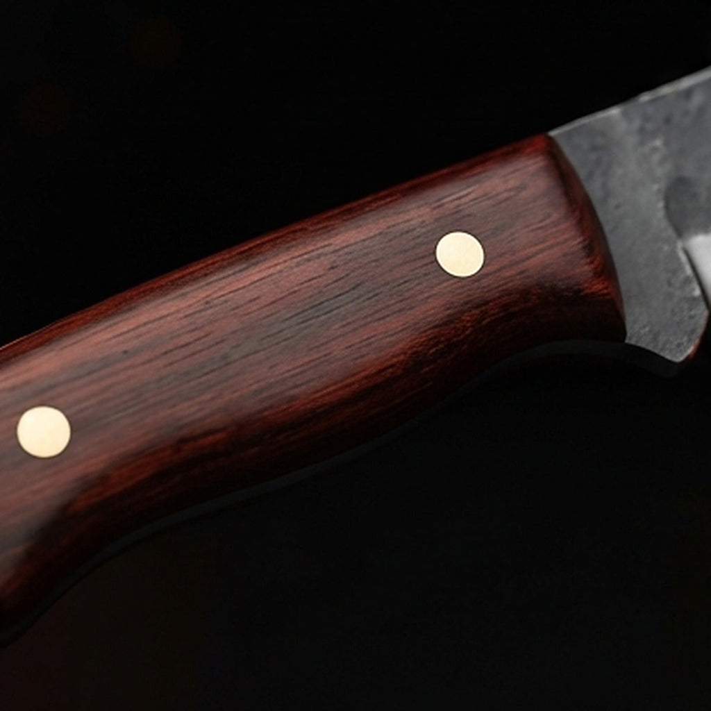 1095 high carbon steel drop point hunting knife with rosewood handle and brass pins, handle close up