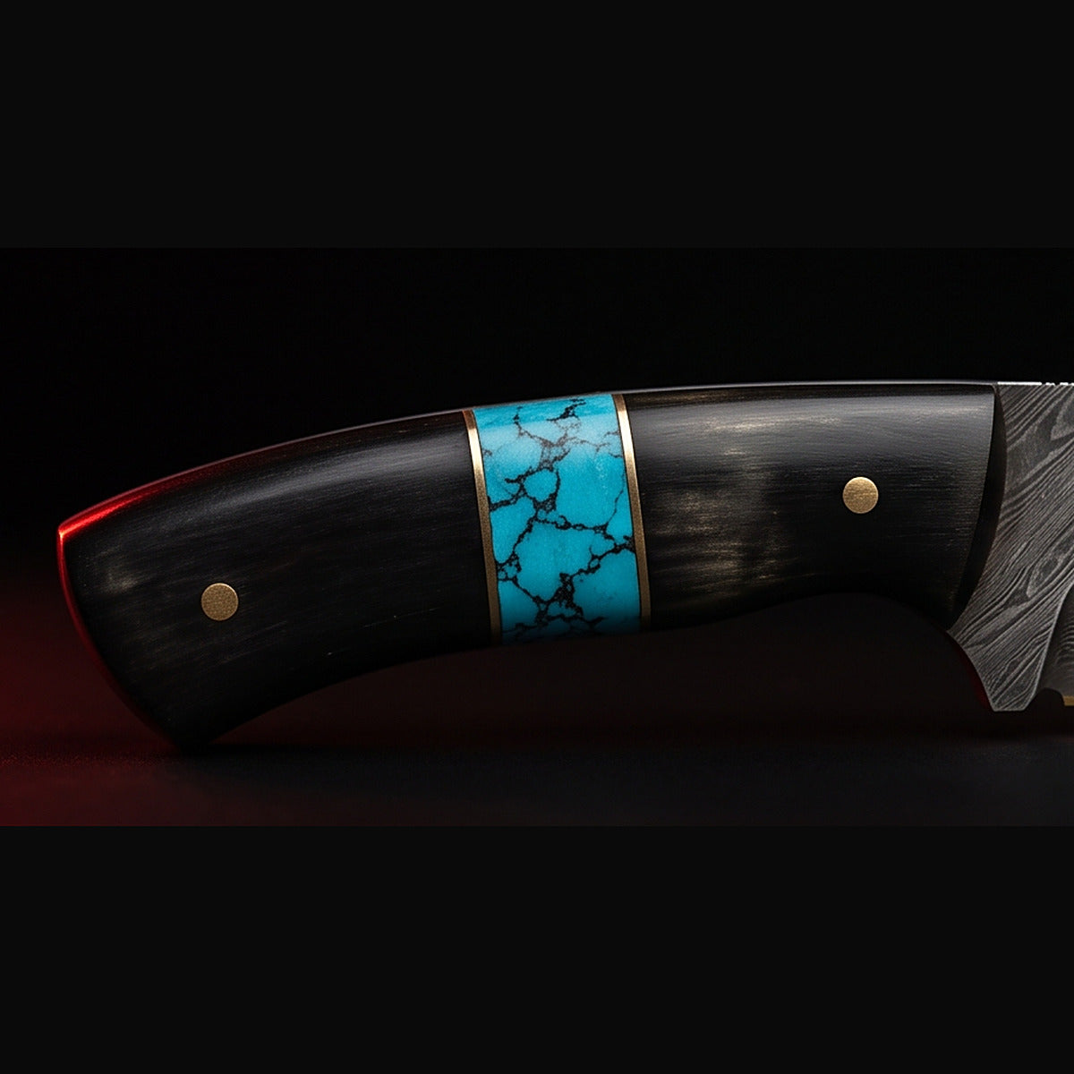 Damascus drop point hunting knife with black horn and turquoise handle, handle close up
