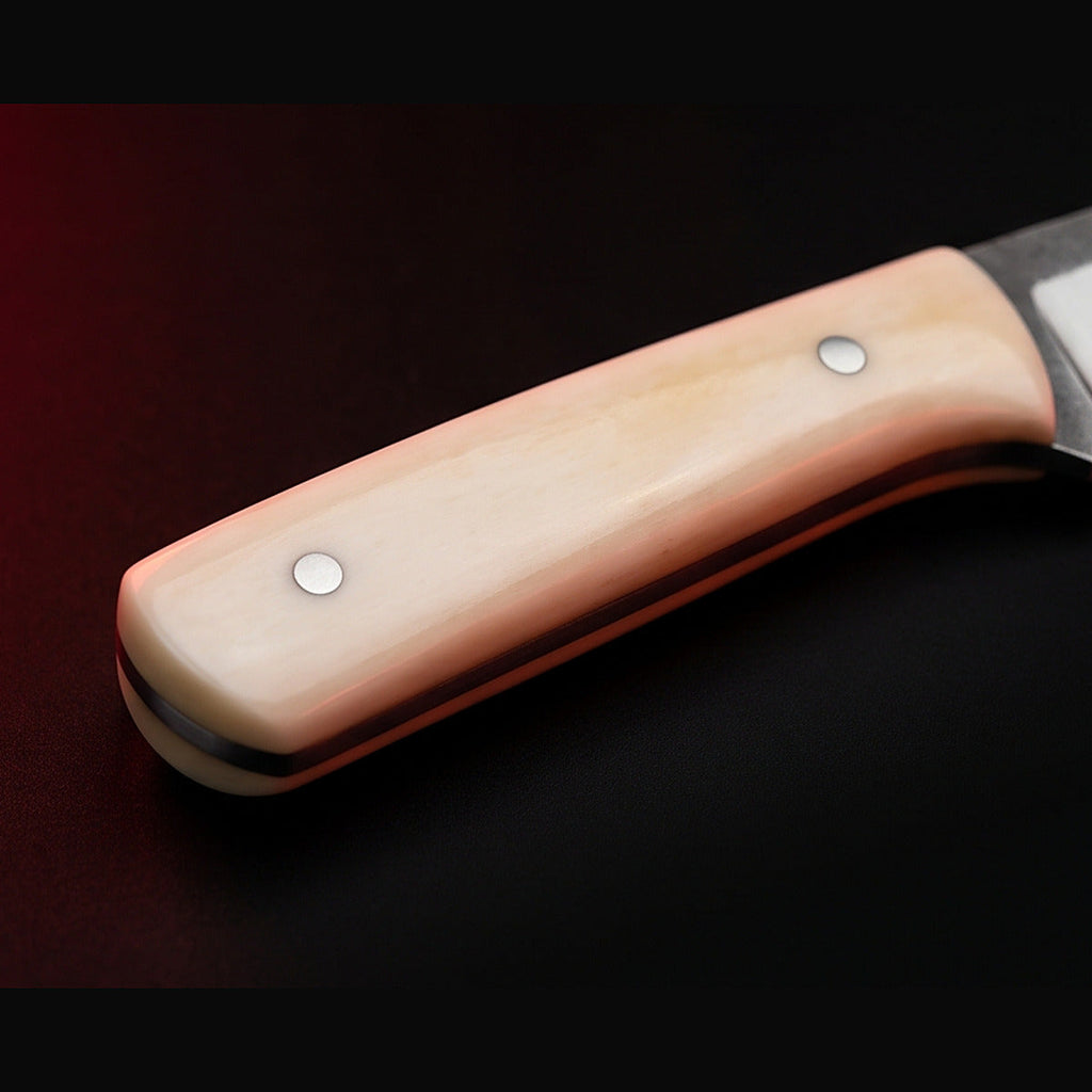D2 steel caping knife with white bone handle, handle close up