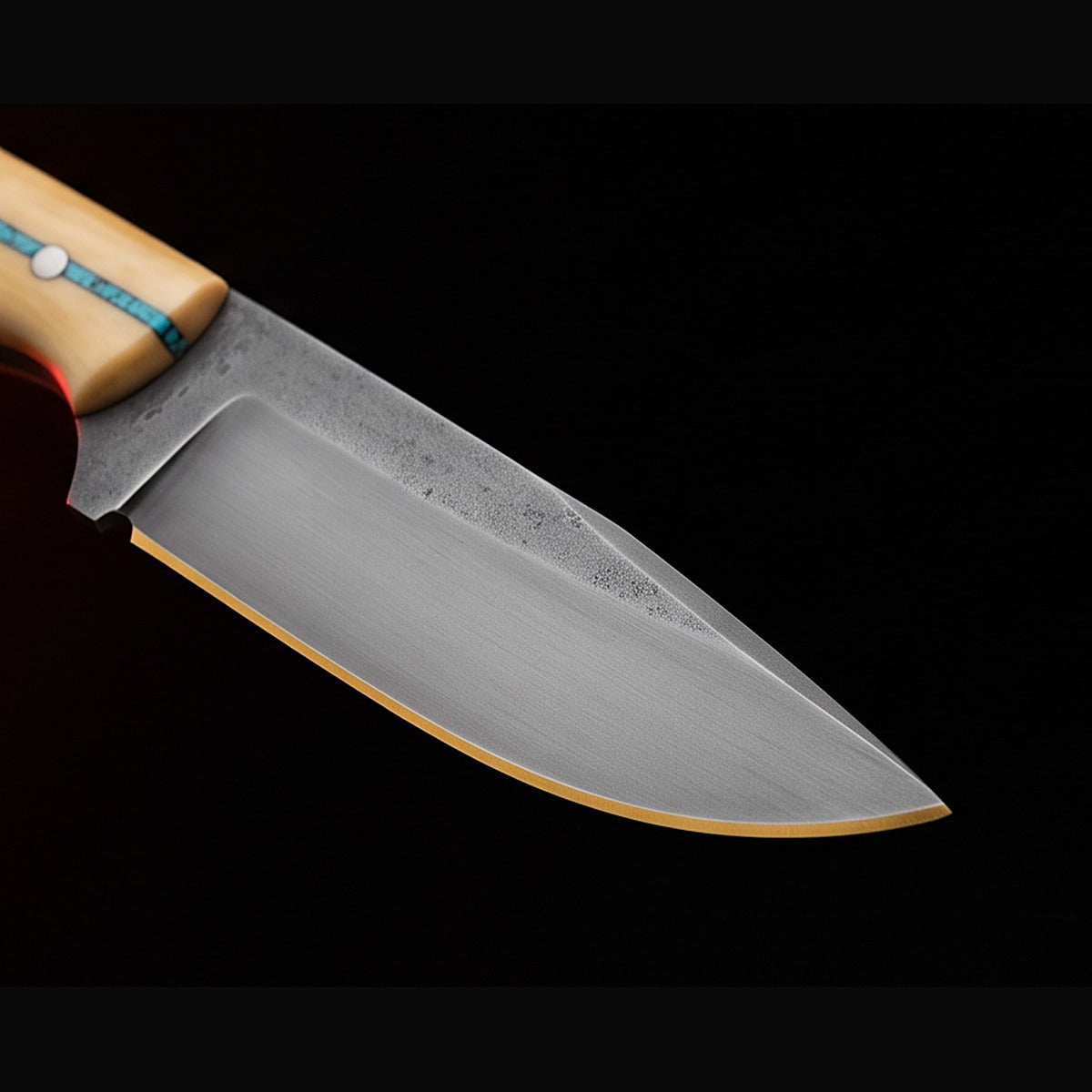 1095 high carbon hunting knife with bone handle and turquoise inlay, blade and cutting edge detail
