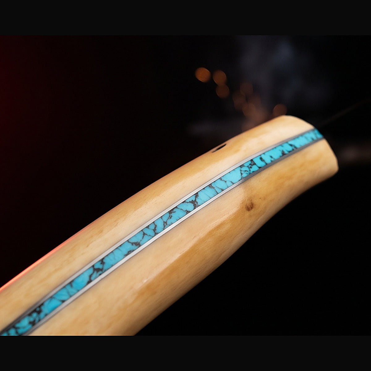 1095 high carbon hunting knife with bone handle and turquoise inlay, handle close up