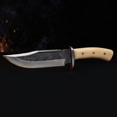 1095 high carbon steel bowie knife with cream bone handle and polished steel guard, left side profile