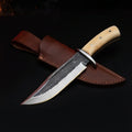 1095 high carbon steel bowie knife with cream bone handle and polished steel guard, with its leather sheath