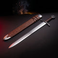 Hand forged medieval arming sword with wheel pommel and tooled leather scabbard