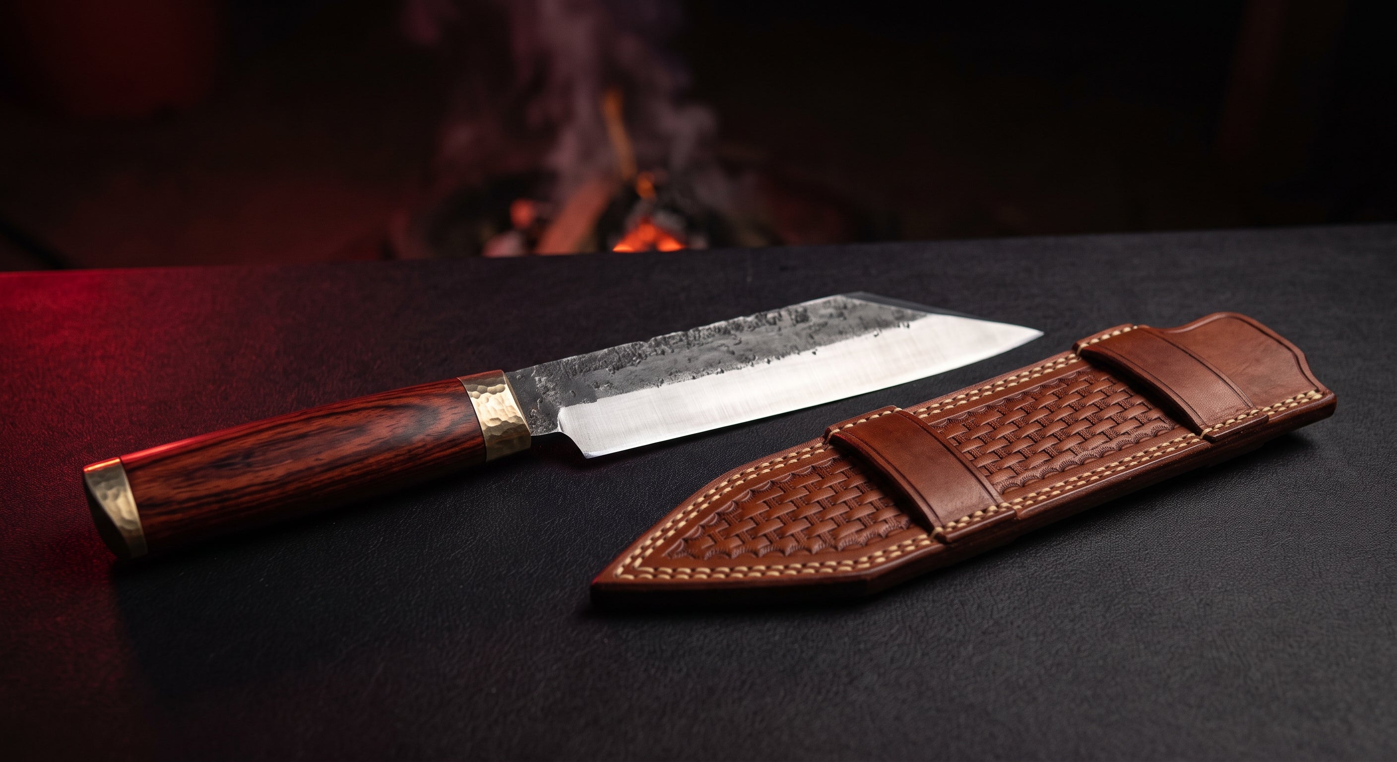 Hand forged broken back seax knife with a rosewood handle and a stamped leather sheath with two top loops