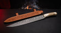 Damascus langseax with an 11 inch ladder pattern blade, stag antler handle and a hand carved leather sheath