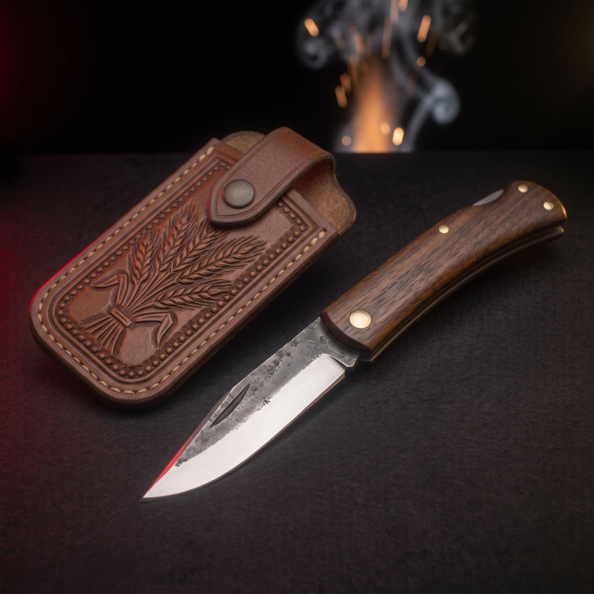 Hand forged sodbuster folding knife with walnut handle and tooled leather pouch